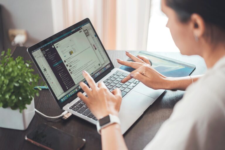 Remote working laws - somebody working remotely on a laptop.