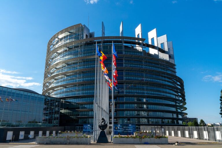 EU Taxonomy and the European Parliament building.