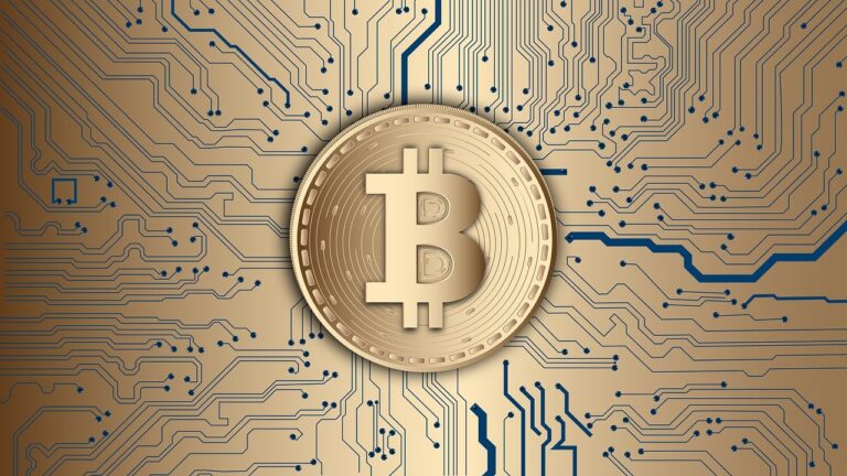 Bitcoins - A circular Bitcoin on top of a gold digital background with interconnecting data points.