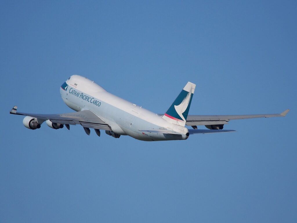 Boeing ITAR Violations, and a picture of a Boeing aeroplane in the sky.