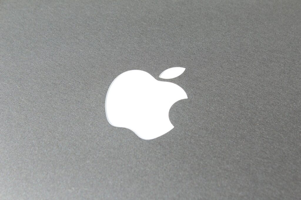 The Apple logo in white with a grey background, one of the companies affected by the EU Digital Markets Act.