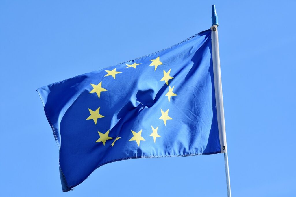 The European Union flag, consisting of a blue background and circle of yellow stars.